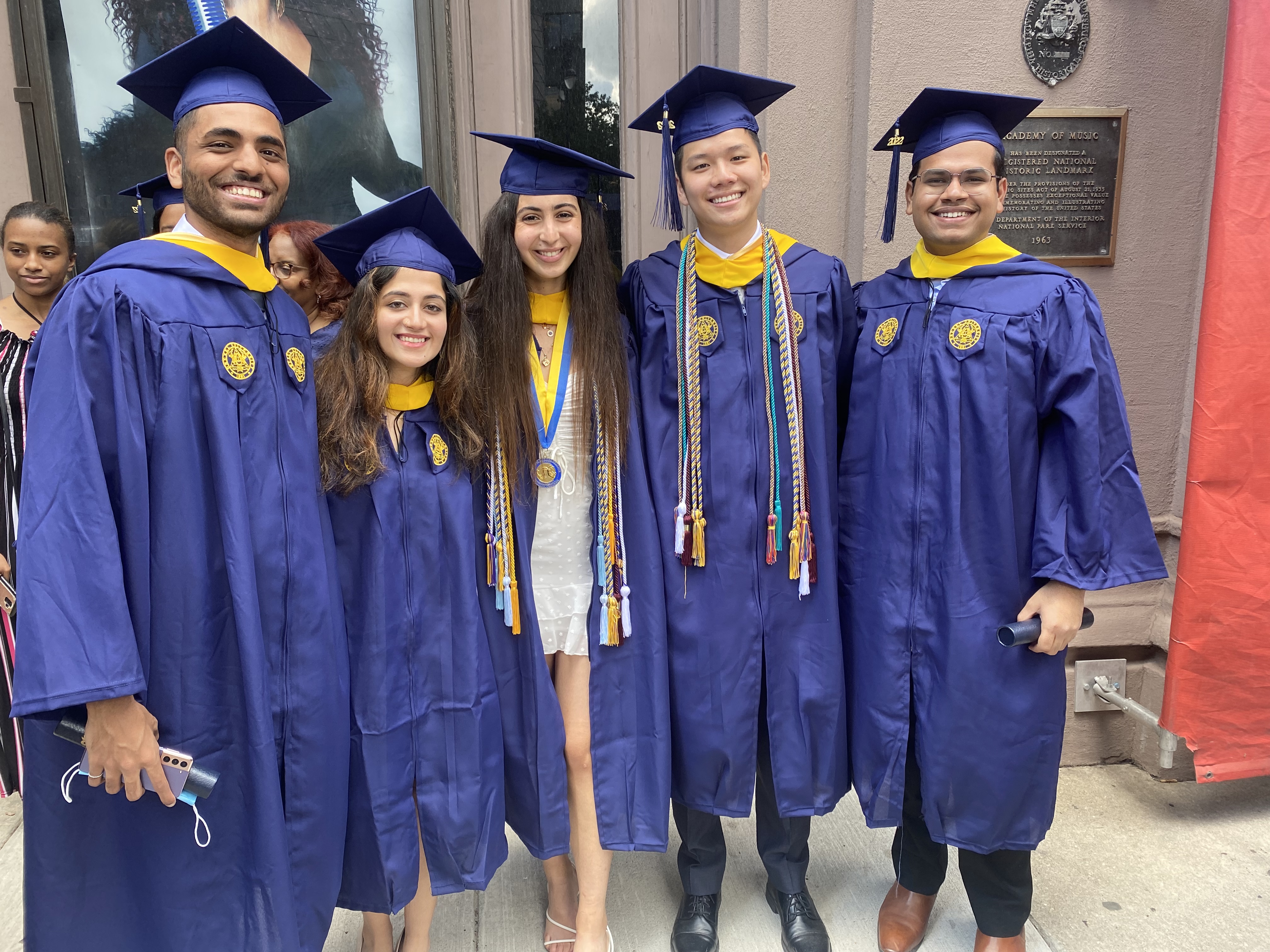 Akriti and fellow Drexel graduates outside the Academy of Music